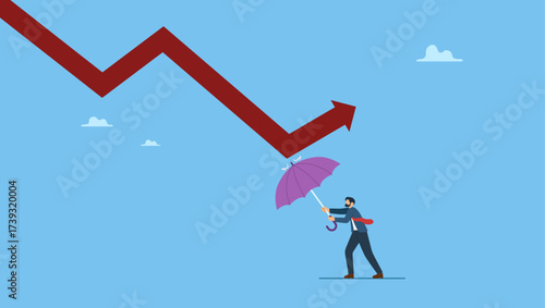 Businessman holding strong umbrella to recover red arrow economic graph. Economic recovery from crisis, business protection or stock market bounce back from recession.