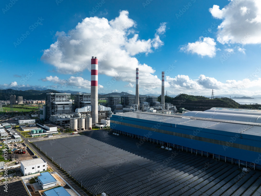 Fototapeta premium aerial view power station under blue sky