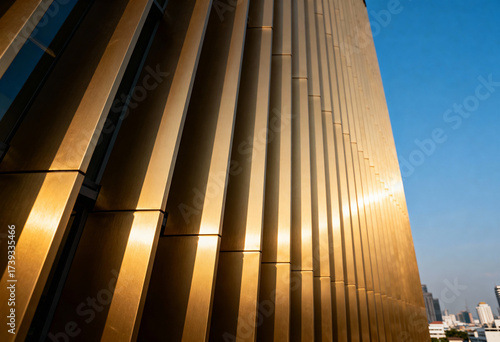 Modern Building Facade Architectural Detail with Golden Sun Reflection