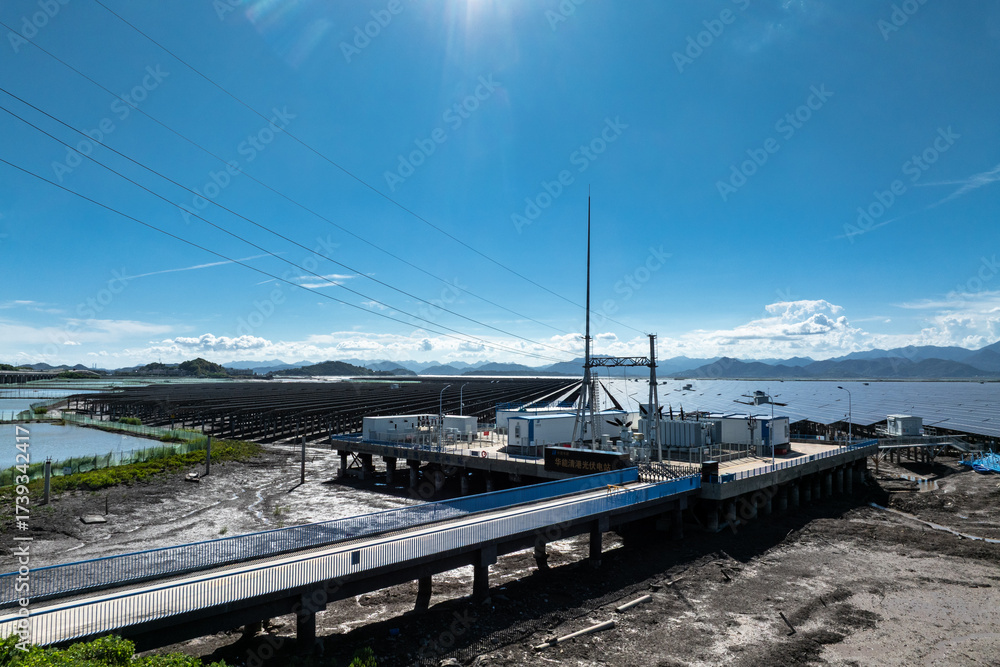 Naklejka premium aerial view solar power station on beach