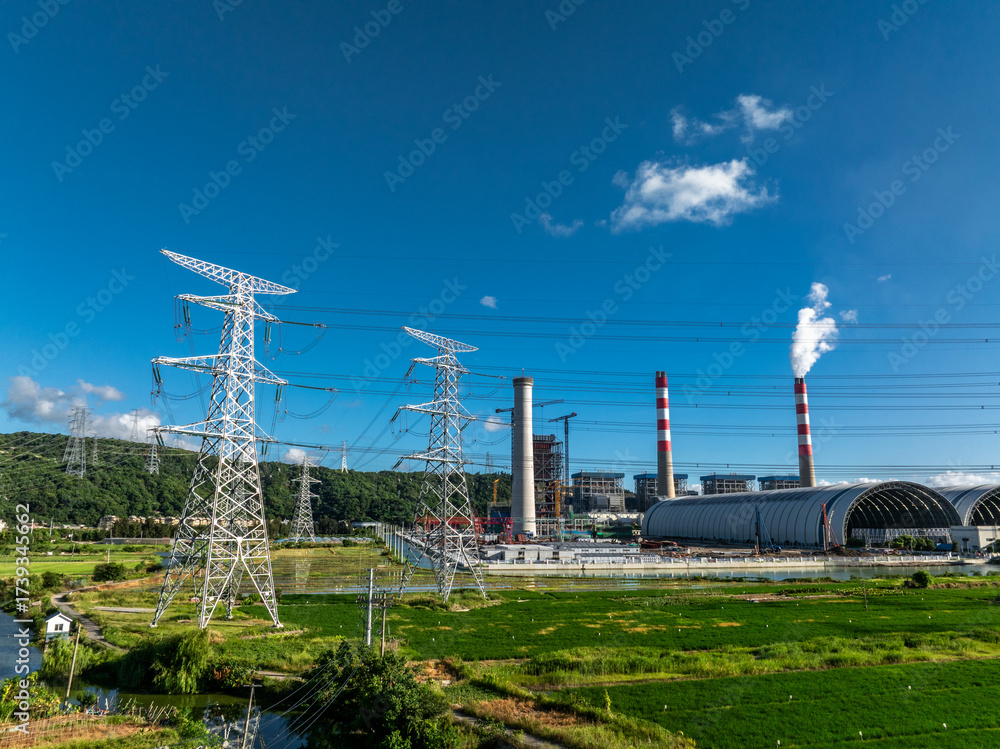 Obraz premium pylon in power station with blue sky