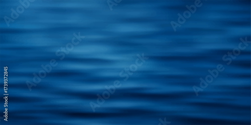 Calm blue ocean water surface with subtle ripples, a natural abstract texture and light reflection