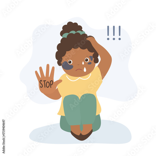 Stop violence against women. Sad kid with gesture - Stop. Equality and tolerance. Stop gender, race discrimination and abuse. Little african american girl with bruise