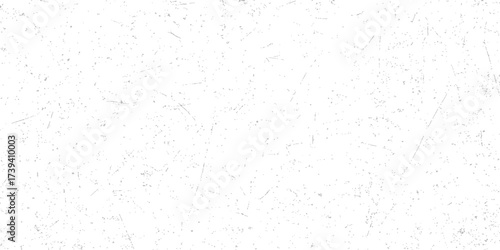 Old, blank white paper texture on a vintage concrete wall is a rough textured background for design use