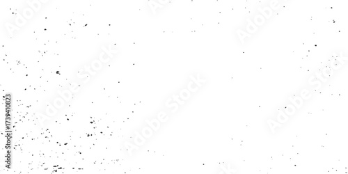 Old grunge paper texture with a rough black ink splat pattern on a dirty vintage surface backdrop