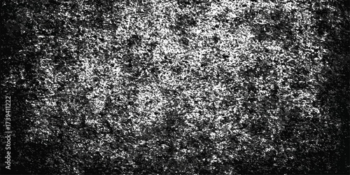 A grunge marble texture surface with a rough, natural black and grey pattern resembling asphalt and metal