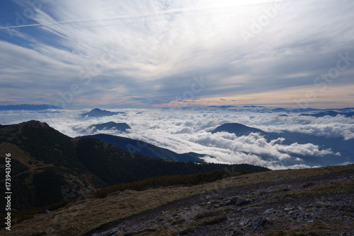 Wallpaper Mural Misty cloud inversion over Malá Fatra mountains, Slovakia, with dramatic sky, layered peaks, and moody atmosphere. Majestic nature and scenic beauty above the clouds. Torontodigital.ca