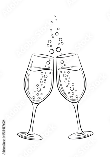 A celebratory toast with two flutes of champagne filled with sparkling bubbles.