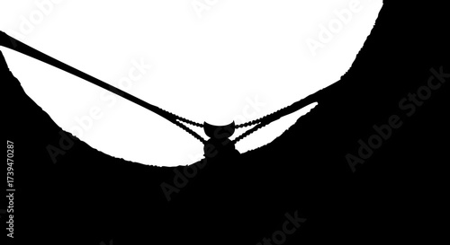 Dramatic bat silhouette flying at night, creating a spooky Halloween mood, perfect for holiday decorations or themed designs, originally a scalable vector graphic