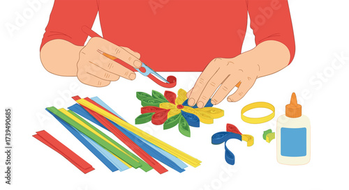 Hands crafting colorful flower from straws and leaves.