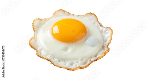 Transparent PNG of a perfectly cooked sunny-side up fried egg with a vibrant yellow yolk and crispy browned edges, isolated for easy graphic design and delicious breakfast meal compositions.