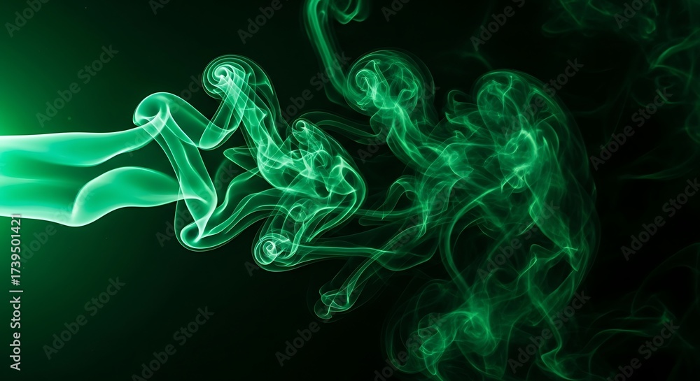 Fototapeta premium Emerald green smoke trails billowing on dark backdrop evoking mystery and abstract beauty