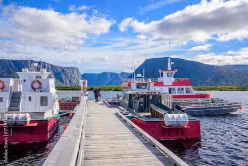 Tour boats at dock inWestern Brook Pond a magnificent fjord which  is a highlight for many visitors to Gros Morne National Park in Newfoundland it is only accessible by tour boat