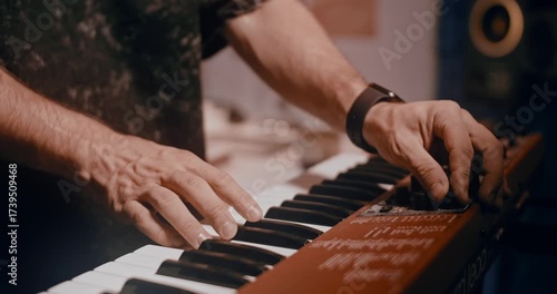 Professional musician plays instruments in the studio, sound recording process