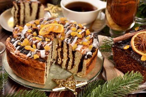 Round zebra poppy seed cake with icing sugar for Christmas