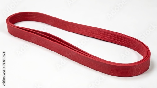 Red rubber band isolated on white background for office and home use