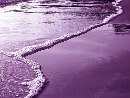 Fototapeta Naklejka Na Ścianę i Meble -  Purple Ocean Wave Foam on Sandy Beach Shoreline