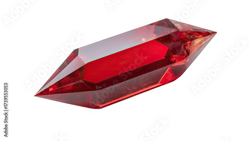 A vibrant, translucent ruby crystal shard with numerous facets set against a black backdrop