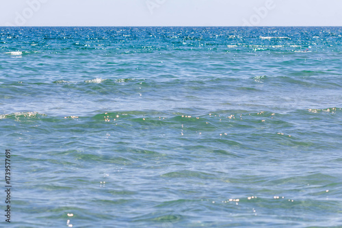 Crossing waves on the seashore surf beach background sunny day