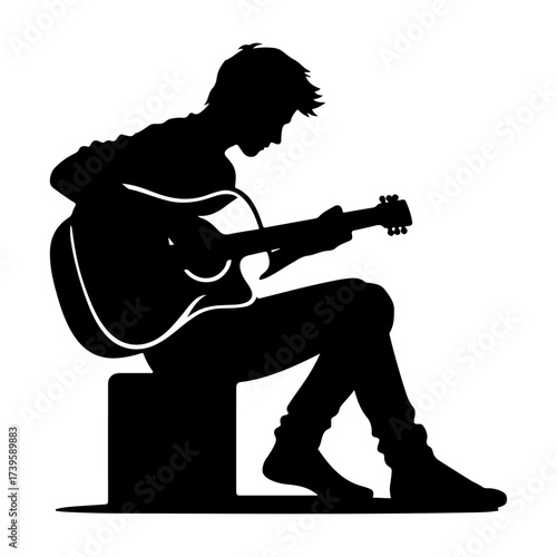 Silhouette of rock musician playing guitar