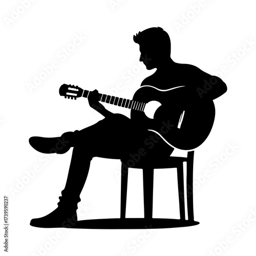 Silhouette of rock musician playing guitar