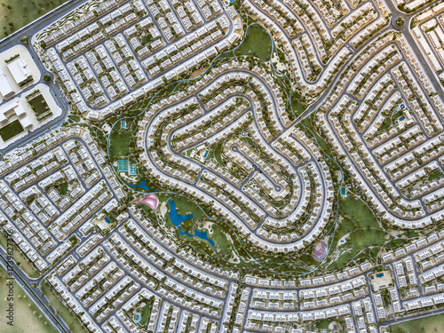 Photography Drone view of a modern green residential township with pool, play area, villas,