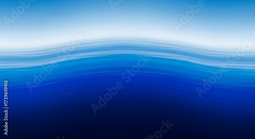 Abstract water background with vibrant shades of blue and smooth wave patterns