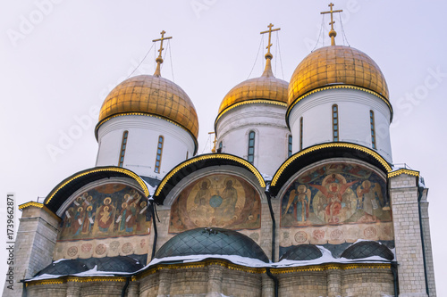 The cathedral with golden domes on the territory of the Moscow Kremlin. Temples of the Moscow Kremlin. The architectural ensemble of Cathedral Square. Culture and heritage in architecture.