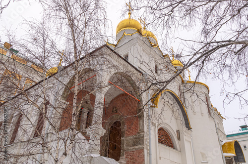 The cathedral with golden domes on the territory of the Moscow Kremlin. Temples of the Moscow Kremlin. The architectural ensemble of Cathedral Square. Culture and heritage in architecture.