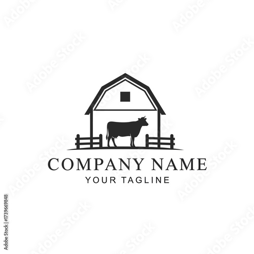 A black and white silhouette logo featuring a cow standing inside a barn with a fence in front.