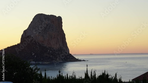 Iconic Massive Rock Of Penyal d'Ifac Natural Park In Calpe, Alicante, Spain. Wide Shot