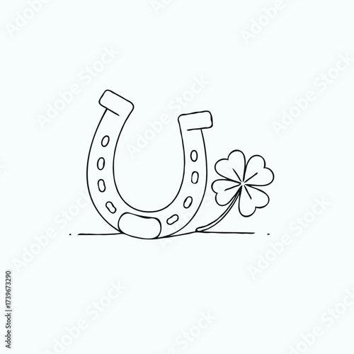Horseshoe and clover symbolizing good luck in simple design  