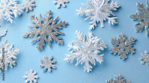 A blue background with many snowflakes on it