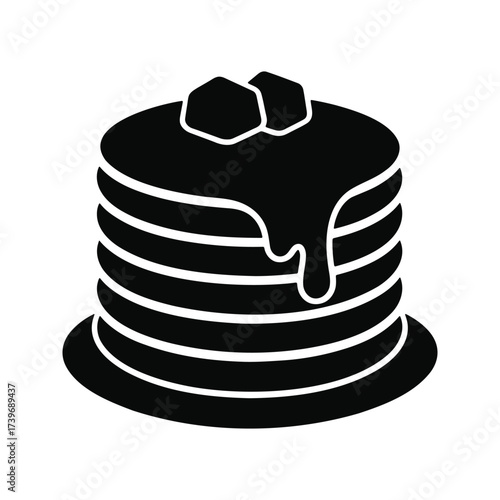 A stack of pancakes with syrup.