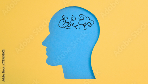 human head profile cut out with healthy brain. Care for good memory, ADHD, Alzheimer, stroke, dementia prevention and world mental health day awareness concept.
