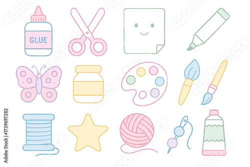Colorful craft tools set with scissors, glue, paint palette, yarn, and more