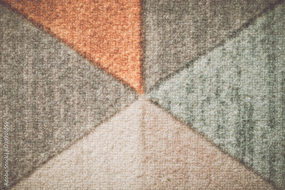 Fototapeta premium The backdrop is adorned with intricate, abstract patterns in a variety of hues.