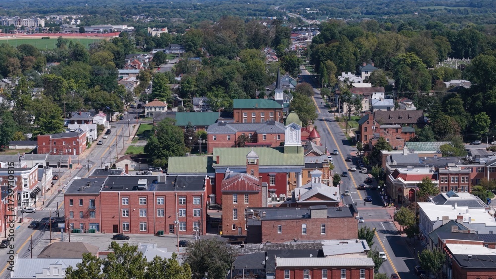 Fototapeta premium Bright Day Aerial Views of Main Street, Charles Town, WV