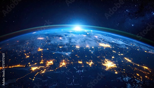 Sunrise Over Illuminated Earth with City Lights and Atmospheric Glow in Dark Blue Space