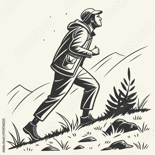 A determined man wearing a cap and jacket hikes up a rocky grassy hill with mountains in the background enjoying the outdoor adventure and scenic view