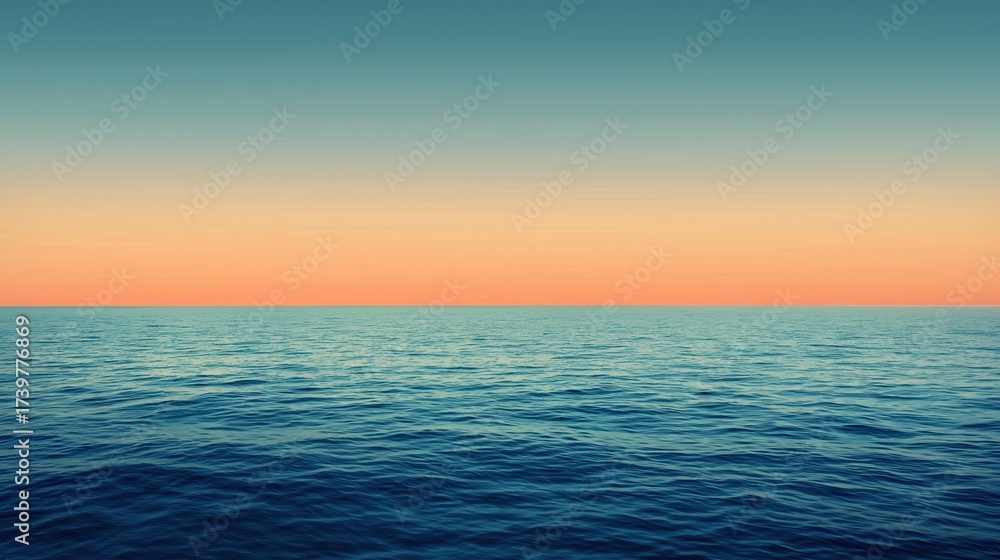 Obraz premium Vast ocean water extending to the horizon under a gradient colored sky