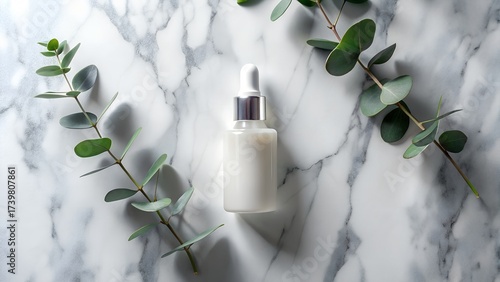 White Serum Bottle on Marble Slab
