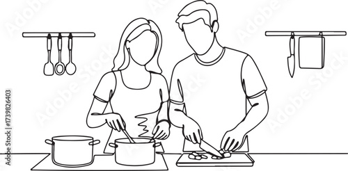 Couple cooking together in a kitchen