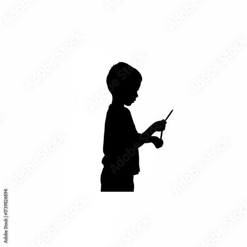 Silhouette of a boy sharpening a pencil isolated on white background