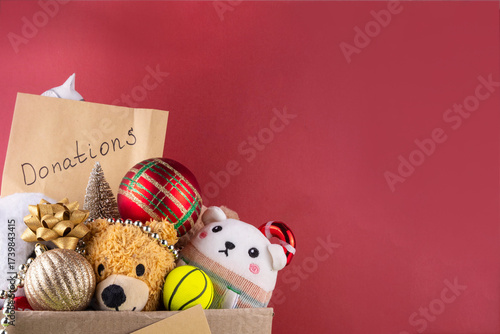 Wallpaper Mural Donating gifts and toys to charity for Christmas holiday concept. Tradition holiday toys drive, cardboard box full with with kids toys, gifts, Christmas decorations, baubles and sweets, copy space Torontodigital.ca
