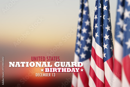 Photography United States National Guard birthday inscription with USA flags on background of sunset sky