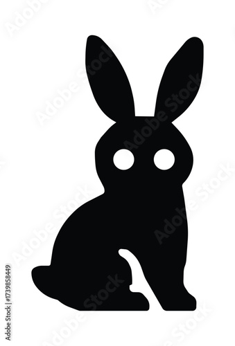Black Silhouette of a Rabbit with Circular Eyes on White Background