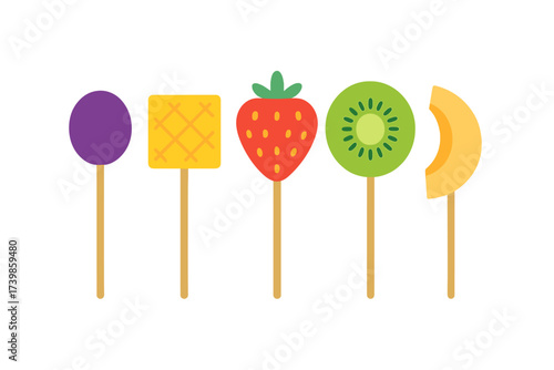 Row of colorful fruit shaped lollipops including strawberry kiwi pineapple and melon slices
