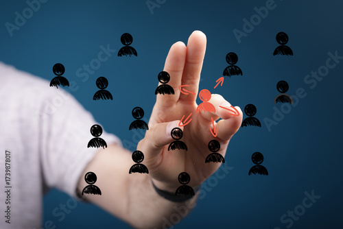 Hand selecting a single per...
