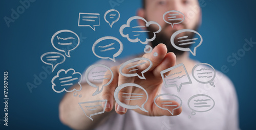 Papier peint Man interacting with floating speech bubbles, symbolizing digital connection and communication